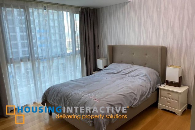 fully furnished 2br unit with parking for sale in one serendra