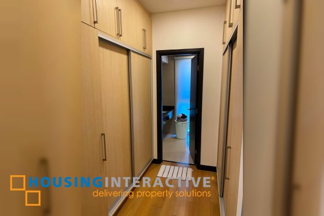 fully furnished 2br unit with parking for sale in one serendra