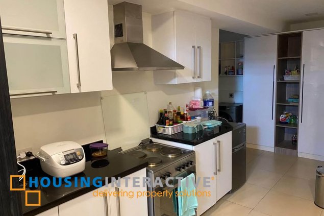 fully furnished 2br unit with parking for sale in one serendra