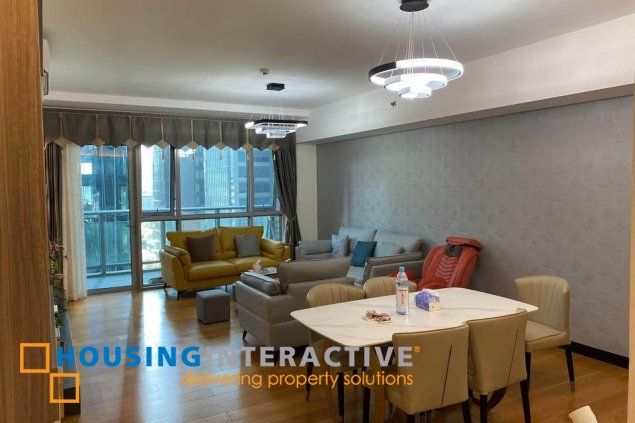 fully furnished 2br unit with parking for sale in one serendra