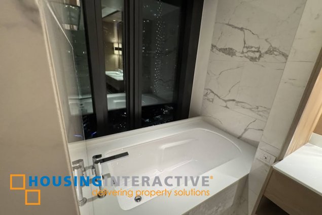 bare 3br unit with parking for lease in aurelia residences