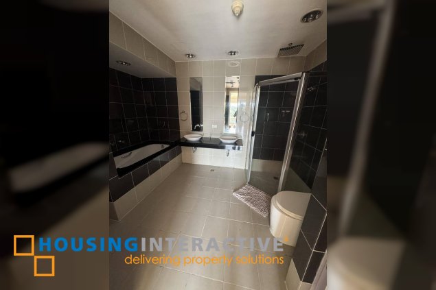 semi-furnished 2br unit with parking for lease in one mckinley place