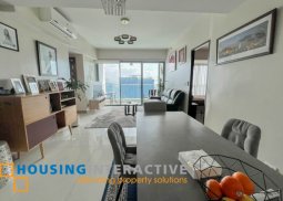 semi-furnished 2br unit with parking for sale in one uptown residences