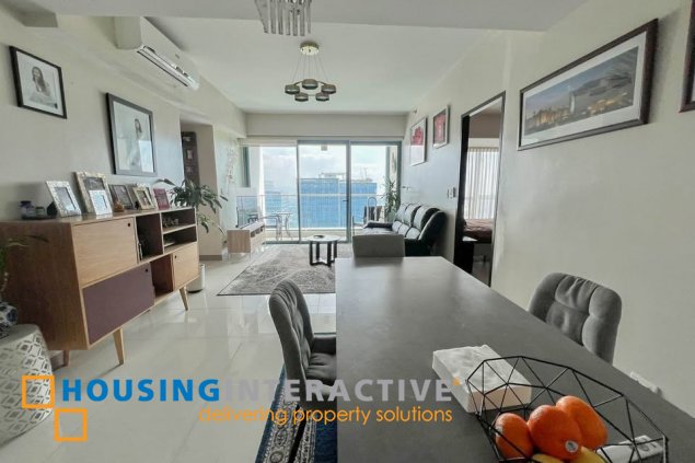 semi-furnished 2br unit with parking for sale in one uptown residences