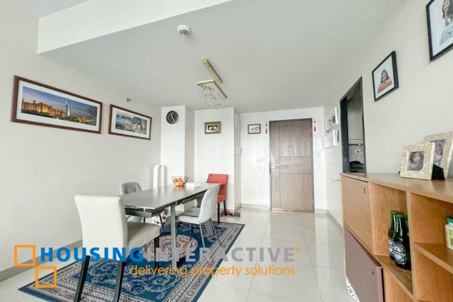 semi-furnished 2br unit with parking for sale in one uptown residences