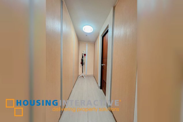 semi-furnished 2br unit with parking for sale in one uptown residences