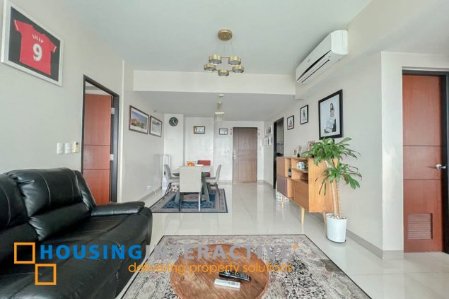 semi-furnished 2br unit with parking for sale in one uptown residences