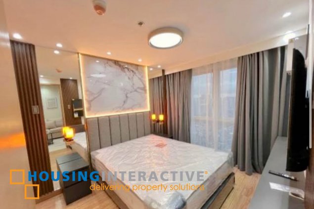 fully furnished 1br unit with balcony and parking for lease in time square west