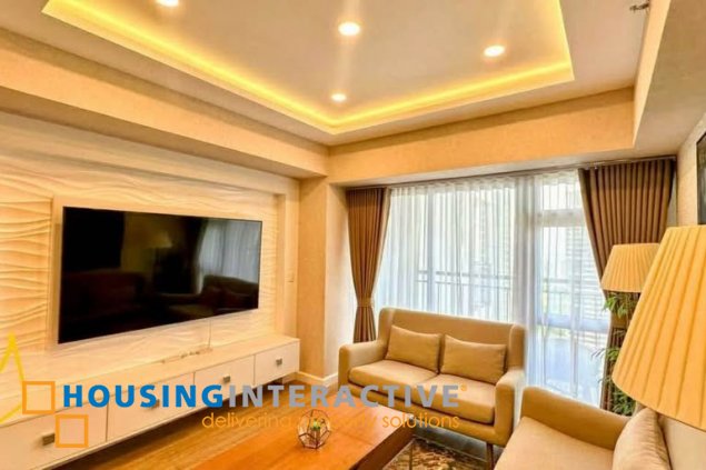 fully furnished 2br unit with balcony for lease in verve residences