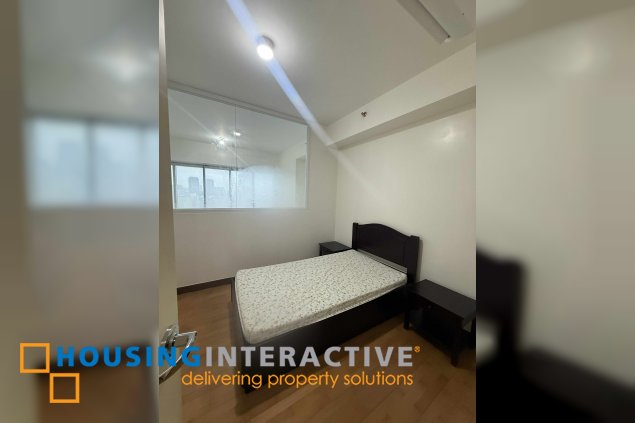 fully furnished 2br unit with balcony and parking for lease in one rockwell