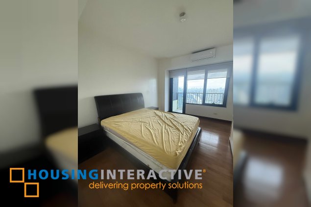 fully furnished 2br unit with balcony and parking for lease in one rockwell