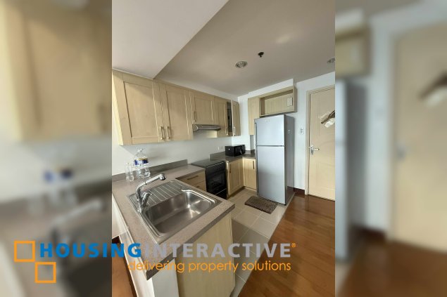 fully furnished 2br unit with balcony and parking for lease in one rockwell