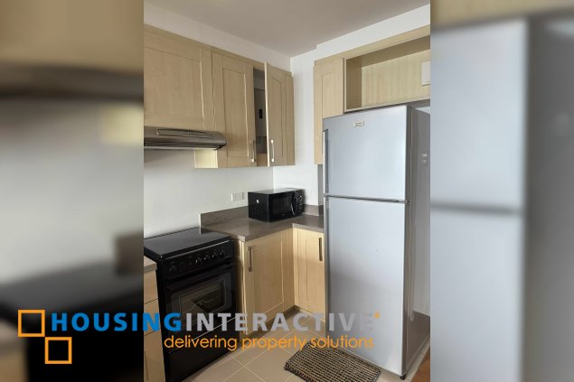 fully furnished 2br unit with balcony and parking for lease in one rockwell