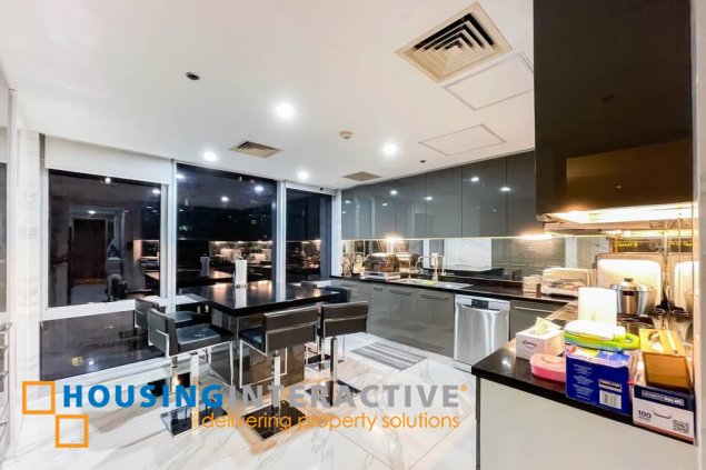 fully furnished 4br unit with parking for sale in raffles residences
