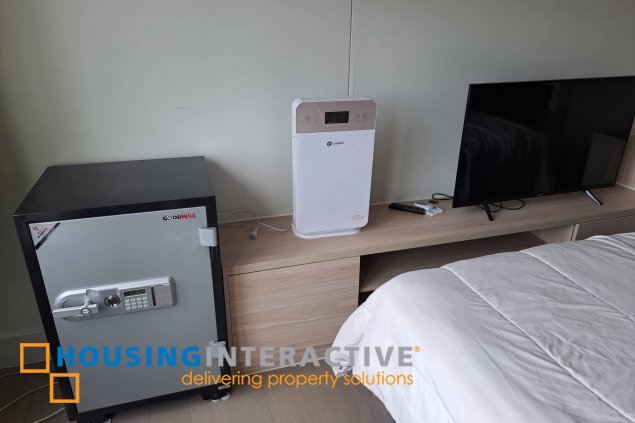 fully furnished 2br unit with parking for sale in proscenium at rockwell