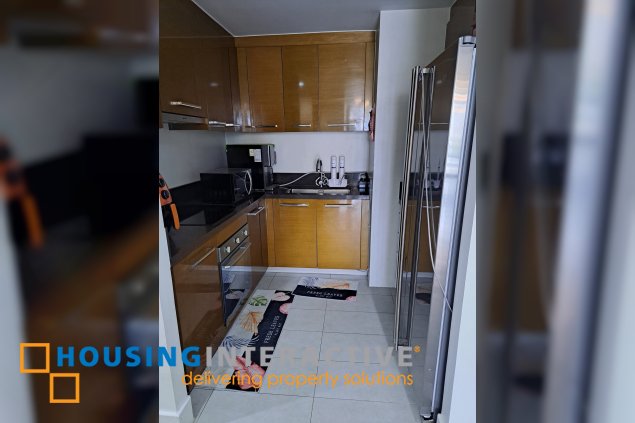 fully furnished 2br unit with parking for sale in proscenium at rockwell