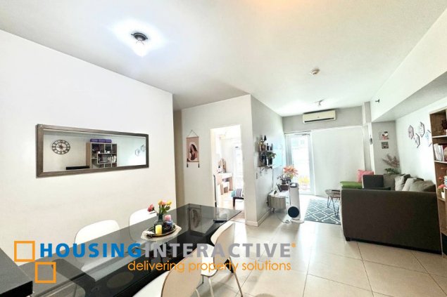 fully furnished 2br unit with parking for sale in two serendra