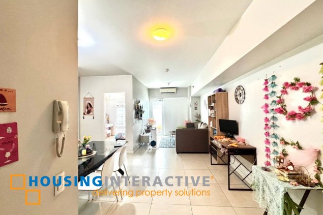 fully furnished 2br unit with parking for sale in two serendra