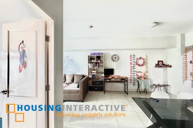 fully furnished 2br unit with parking for sale in two serendra