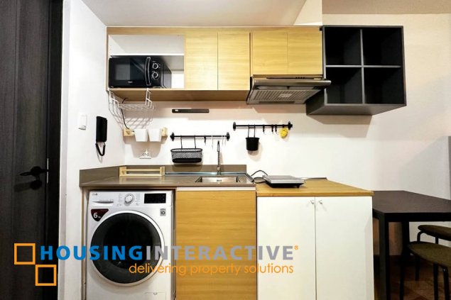 furnished 1br unit for sale in the rise