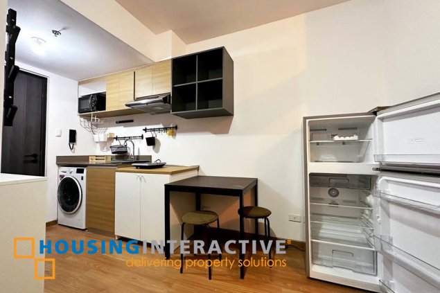 furnished 1br unit for sale in the rise