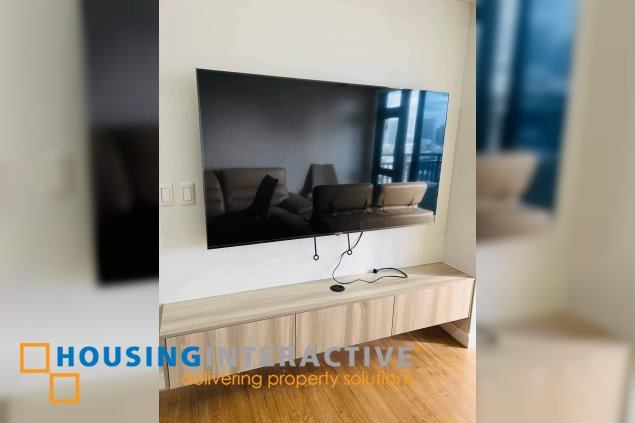 semi-furnished 3br unit with parking for rent in the sandstone at portico