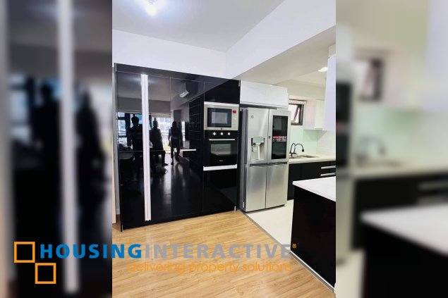 semi-furnished 3br unit with parking for rent in the sandstone at portico