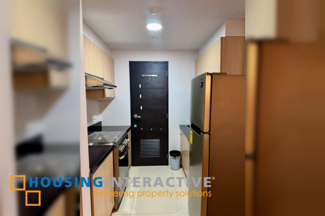 furnished 1br unit with parking for sale in two serendra