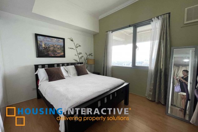 semi-furnished 1br unit with parking for sale in the infinity tower