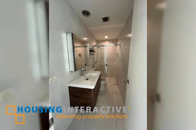 semi furnished 2br with balcony and parking for lease in taguig