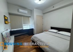 furnished 2br with balcony and parking for sale in the residences at greenbelt