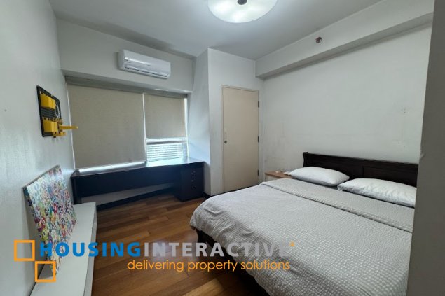 furnished 2br with balcony and parking for sale in the residences at greenbelt