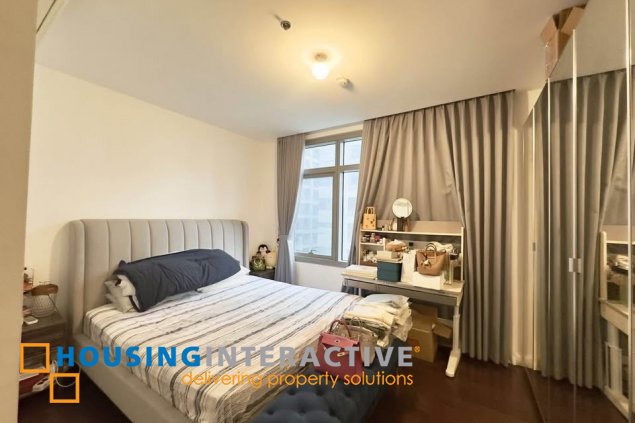 furnished 2br unit with parking for sale in the suites