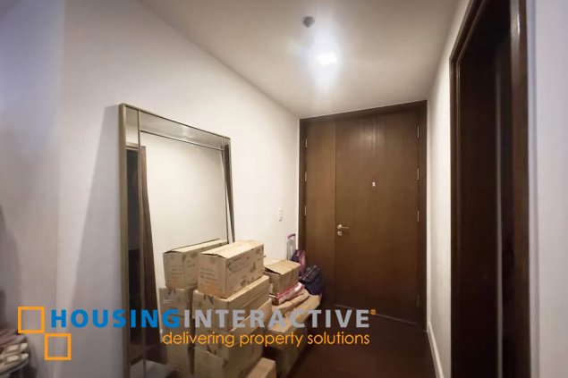 furnished 2br unit with parking for sale in the suites