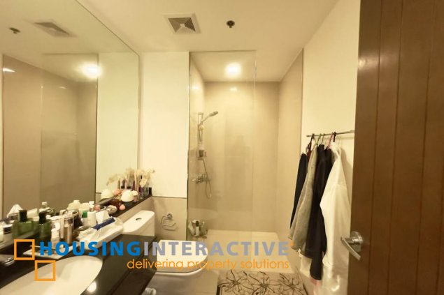 furnished 2br unit with parking for sale in the suites