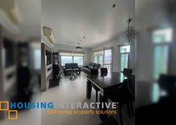 fully furnished 2br unit with parking for sale in two serendra