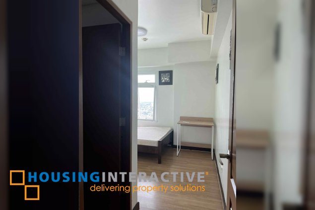 fully furnished 2br unit with parking for sale in two serendra