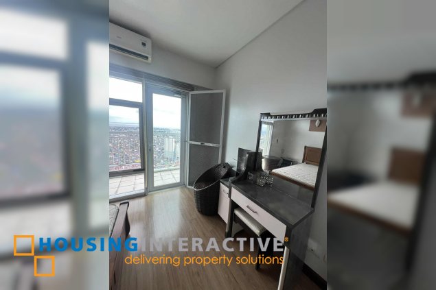 fully furnished 2br unit with parking for sale in two serendra