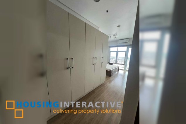 fully furnished 2br unit with parking for sale in two serendra