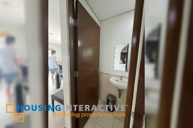 fully furnished 2br unit with parking for sale in two serendra