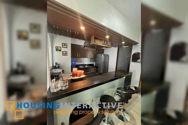 fully furnished 2br unit with parking for sale in two serendra