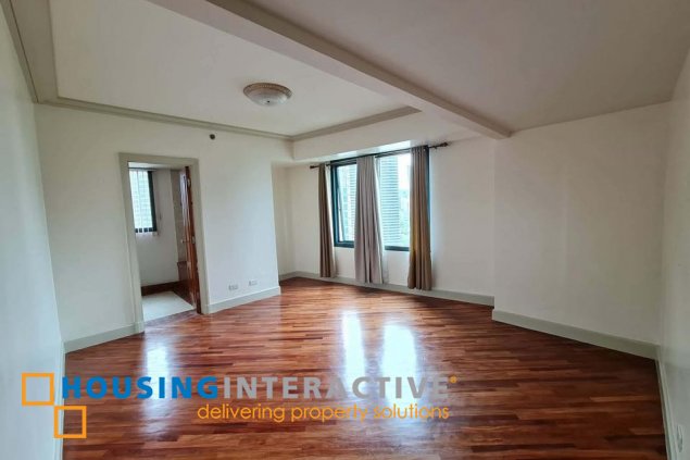 semi-furnished 2br unit with balcony and parking for lease in amorsolo square