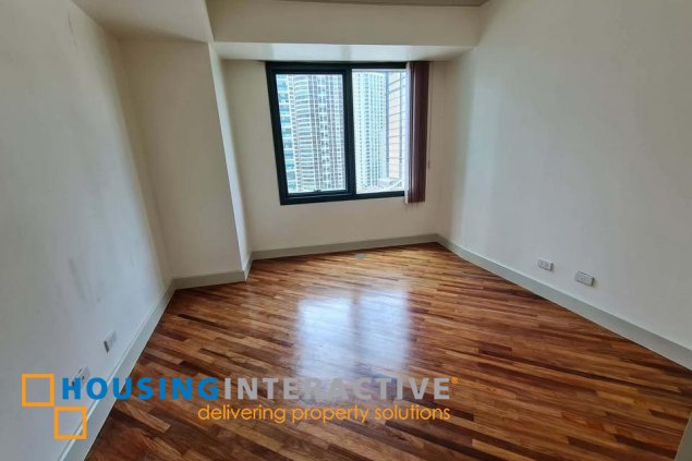 semi-furnished 2br unit with balcony and parking for lease in amorsolo square