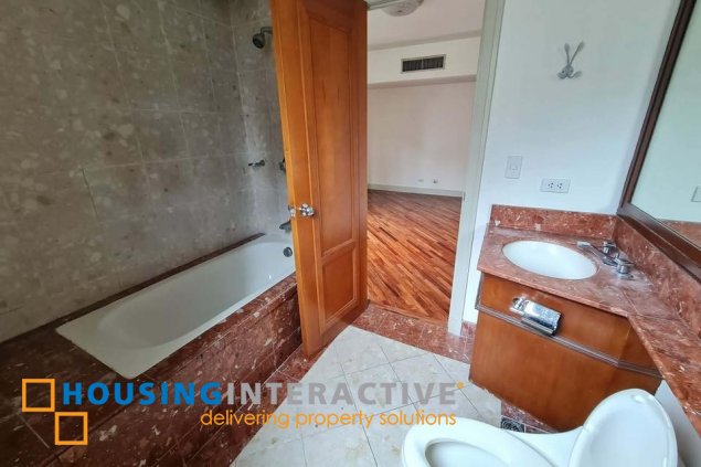 semi-furnished 2br unit with balcony and parking for lease in amorsolo square