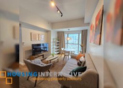 nicely furnished 2br with parking for lease in natsu tower, bgc