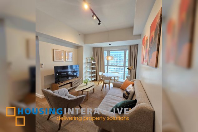 nicely furnished 2br with parking for lease in natsu tower, bgc