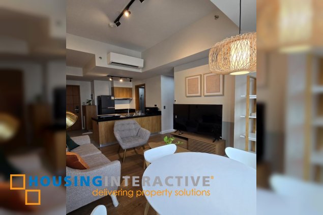 nicely furnished 2br with parking for lease in natsu tower, bgc