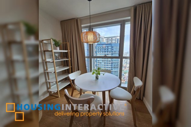 nicely furnished 2br with parking for lease in natsu tower, bgc