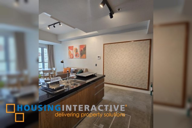 nicely furnished 2br with parking for lease in natsu tower, bgc