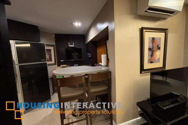 furnished 1br with parking slots for sale in one rockwell east tower